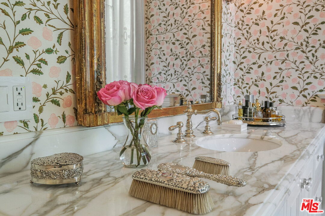 14100 Rustic Lane Pacific Palisades, CA 90272 - Photo 24 of 46 a living room with patio furniture