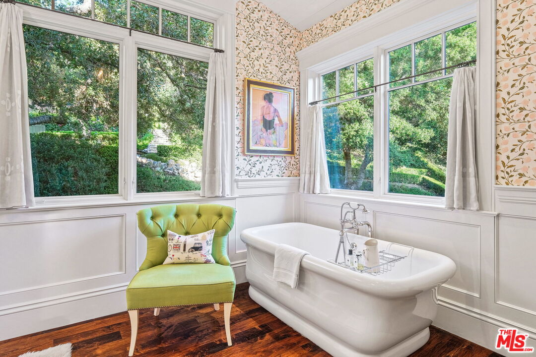 14100 Rustic Lane Pacific Palisades, CA 90272 - Photo 25 of 46 a bathroom with a sink and a bathtub