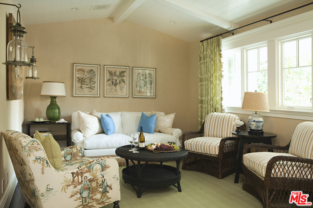 14100 Rustic Lane Pacific Palisades, CA 90272 - Photo 33 of 46 a living room with furniture or couch and a two large window