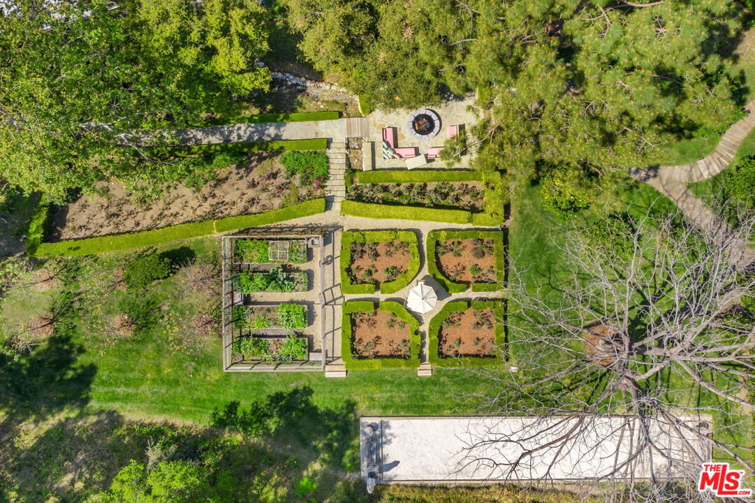 14100 Rustic Lane Pacific Palisades, CA 90272 - Photo 38 of 46 a sign that is on the side of a building