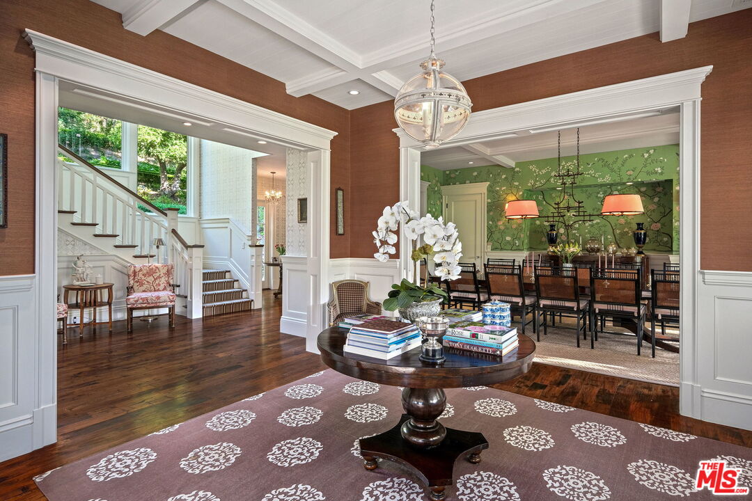 14100 Rustic Lane Pacific Palisades, CA 90272 - Photo 7 of 46 a living room with lots of furniture and a large window