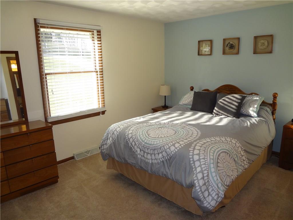 167 Town Country Road Vanderbilt, PA 15486 - Photo 13 of 25 Lovely Master Bedroom with Neutral Carpeting and Cool tone paint. A nice retreat at the end of the day.