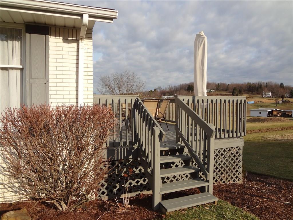167 Town Country Road Vanderbilt, PA 15486 - Photo 25 of 25 Steps from the Deck also lead to the front of the home. This home is a real "Home Sweet Home".