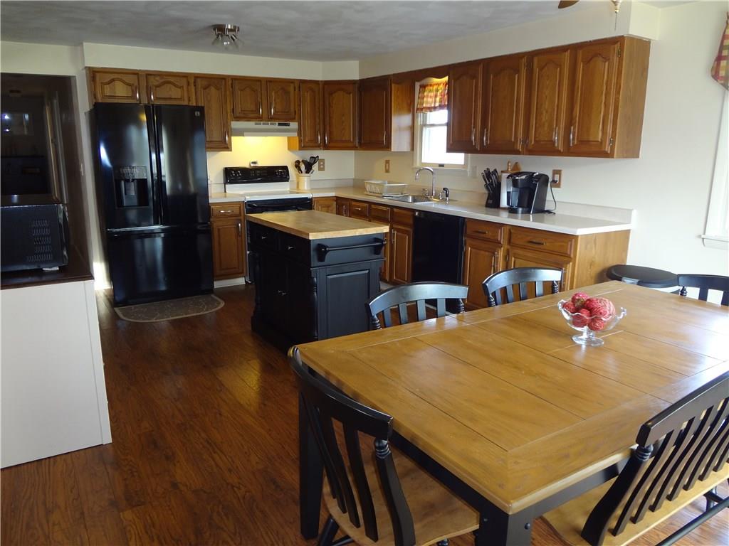167 Town Country Road Vanderbilt, PA 15486 - Photo 6 of 25 Updated, Applianced Kitchen with Island and plenty of room for Dining and Entertaining Family and Friends.