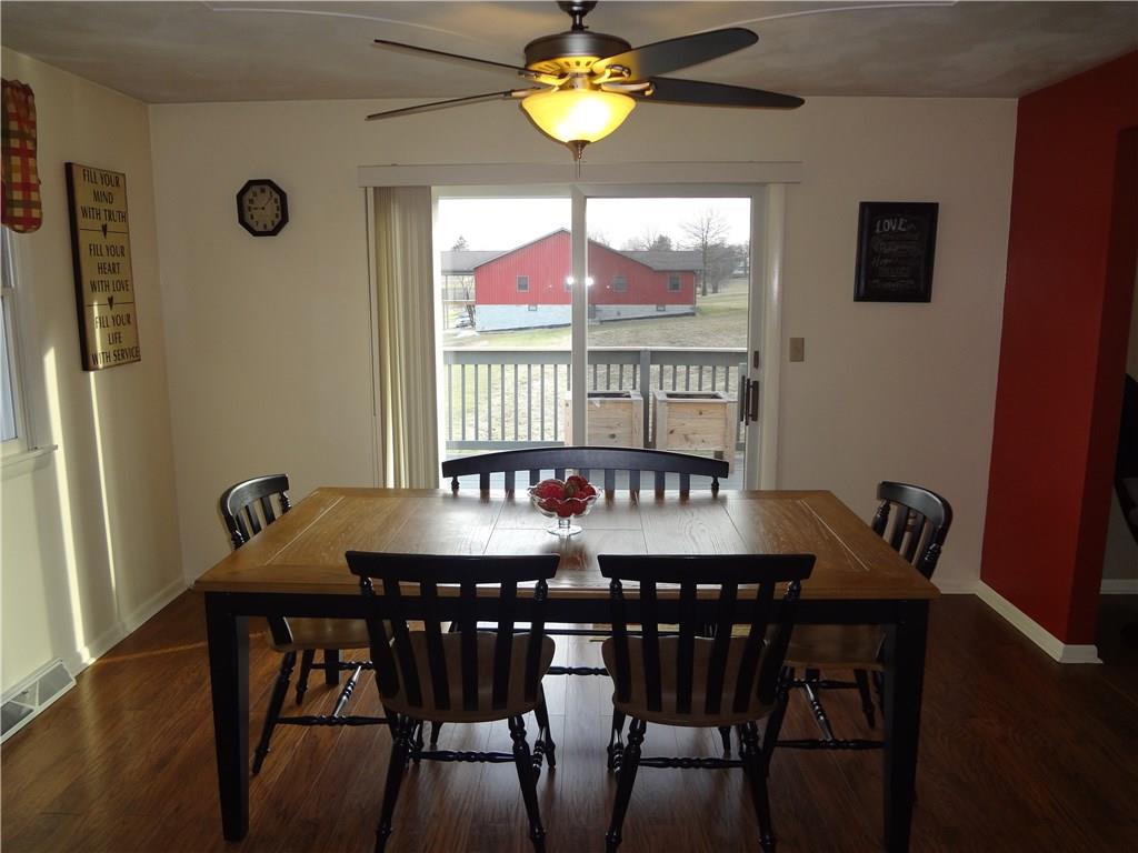 167 Town Country Road Vanderbilt, PA 15486 - Photo 8 of 25 Another View of the Dining Room with Sliding Glass Doors to the Deck for enjoying the outdoors.