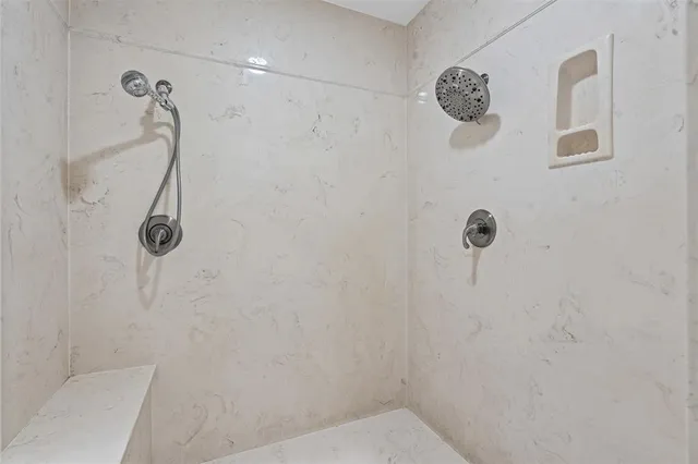 a bathroom with a double vanity sink mirror and double