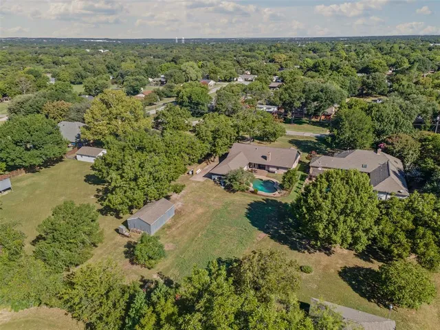 a view of a garden with an outdoor space