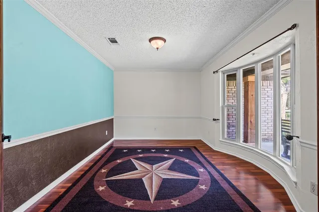 a view of a room with window and stairs