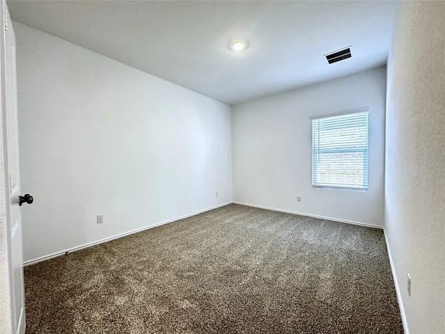 an empty room with a natural light