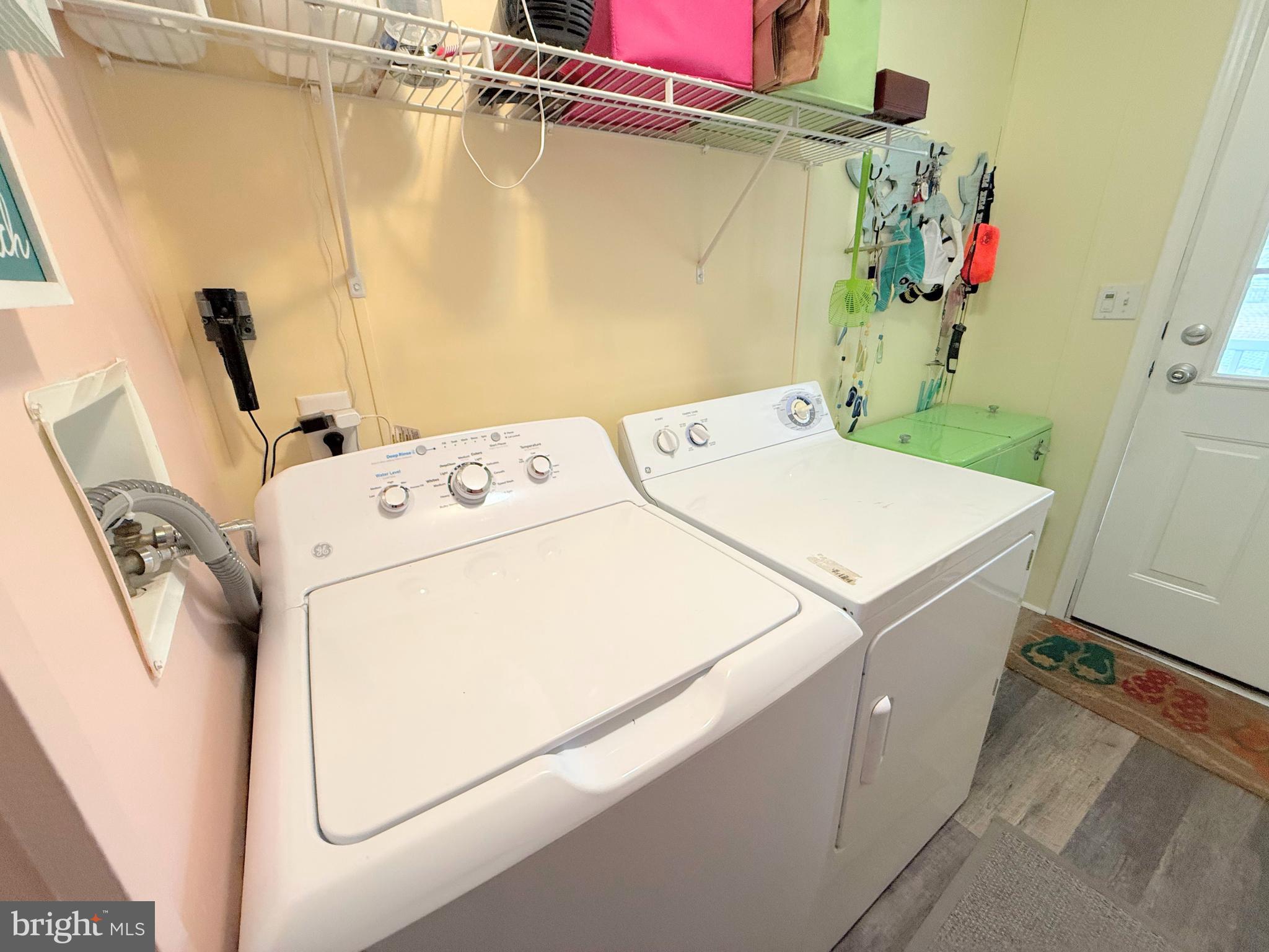 34488 Easy Street, Unit E810 Long Neck, DE 19966 - Photo 35 of 55 a utility room with dryer and washer