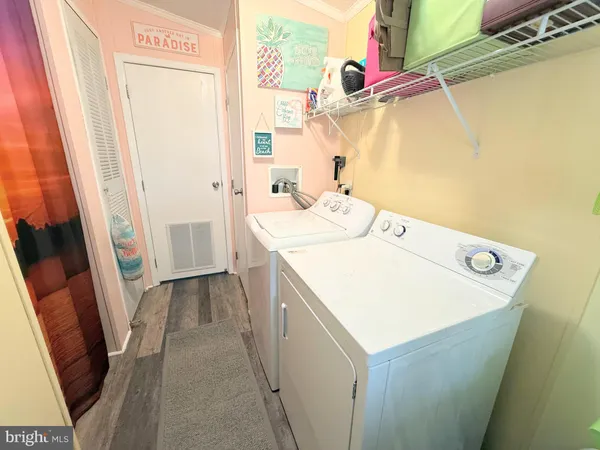 a couple of chairs sitting in patio of a house