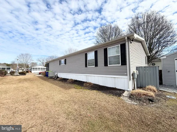 a view of backyard of house