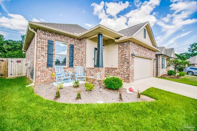 a view of a house with a swimming pool
