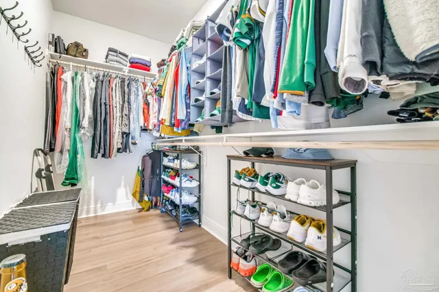 a view of backyard with outdoor seating and stairs