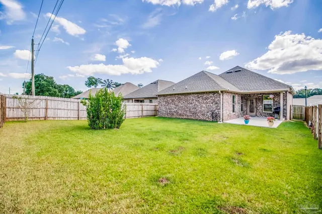 a view of a porch with a garden