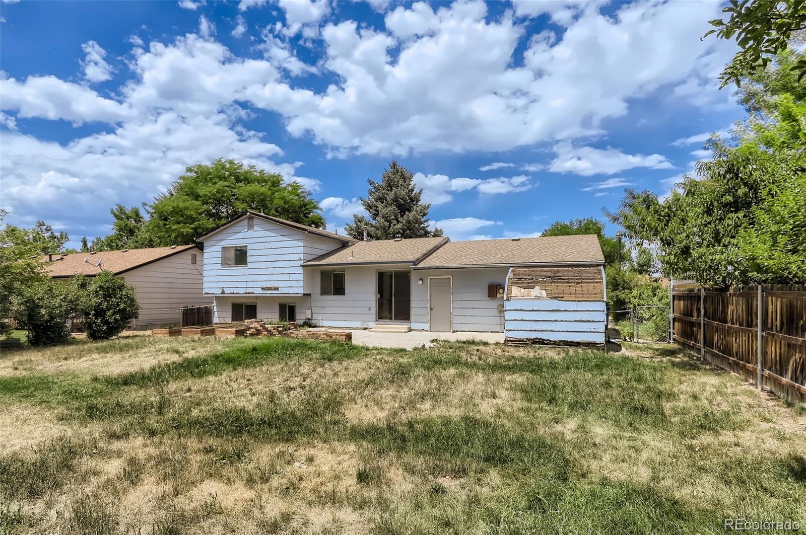 216 Summit Circle Lafayette, CO 80026 - Photo 27 of 31 a house view with a garden