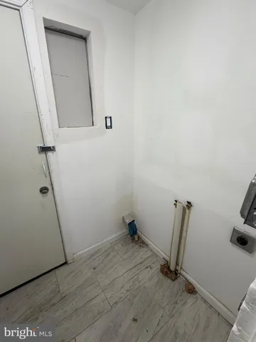 a bathroom with a toilet and a sink