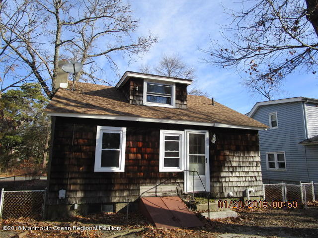 24 Sunset Road Brick, NJ 08723 - Photo 2 of 15 a front view of a house with garden