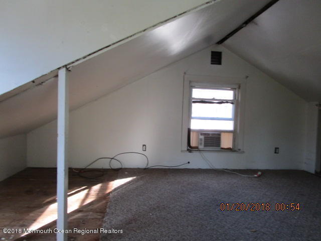 24 Sunset Road Brick, NJ 08723 - Photo 13 of 15 a view of empty room with window