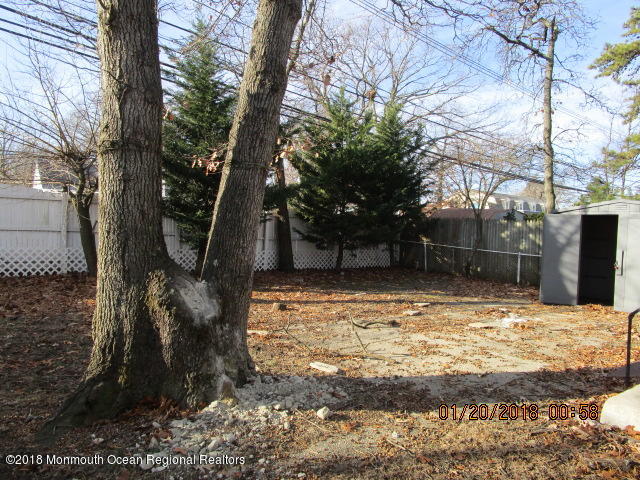 24 Sunset Road Brick, NJ 08723 - Photo 3 of 15 a backyard of a house with lots of green space