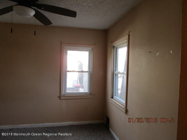 24 Sunset Road Brick, NJ 08723 - Photo 9 of 15 a view of an empty room with a window
