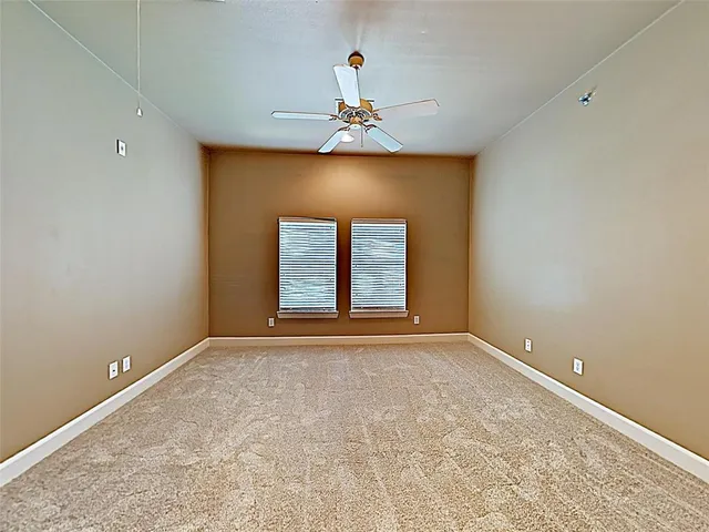 a view of an empty room with window