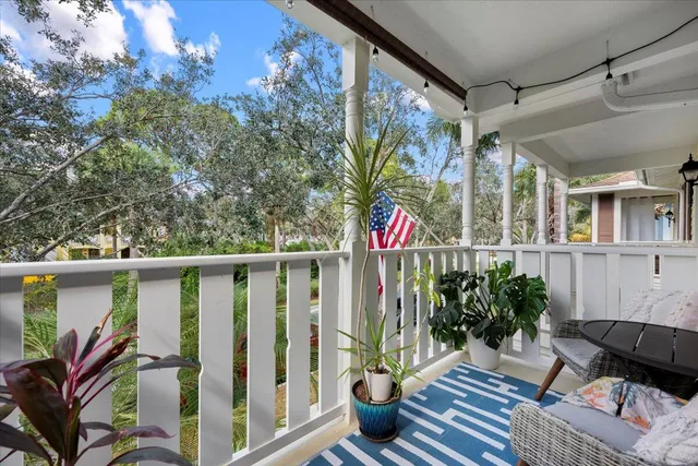 a bathroom with a sink double vanity granite tub and a mirror