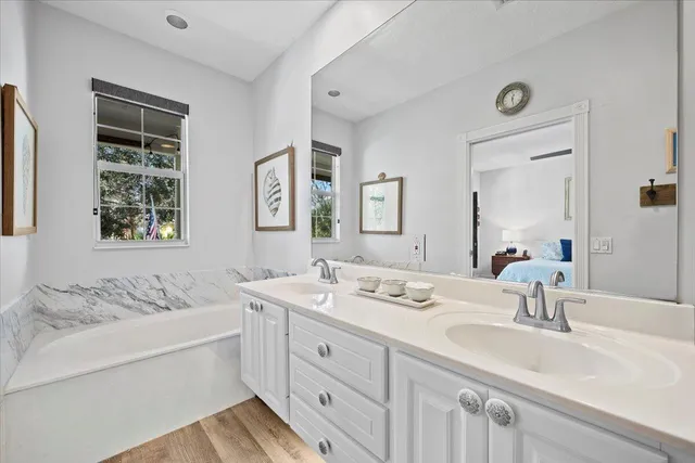 a bedroom with a bed furniture and a window