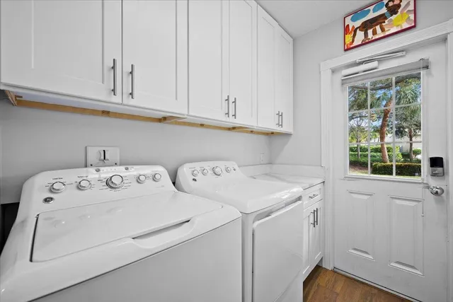 a spacious bedroom with a bed and a large window