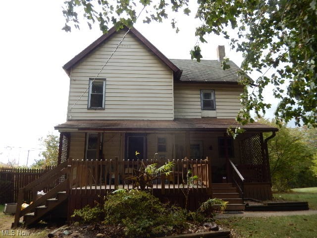 1302 Duncan Street Southwest Massillon, OH 44647 - Photo 5 of 22 Rear view of house featuring a deck