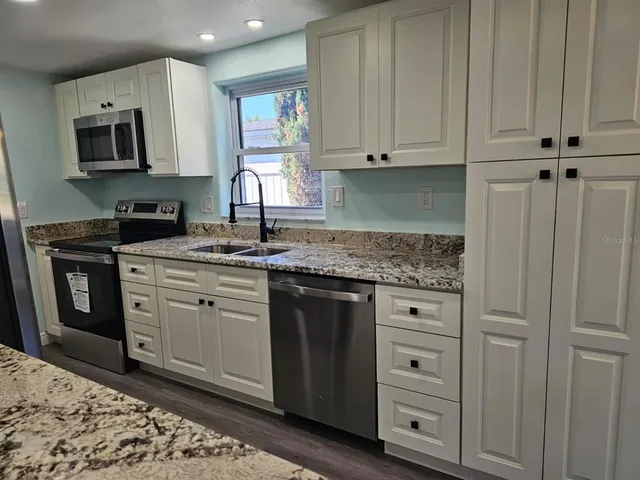 a view of a lot of water heater room