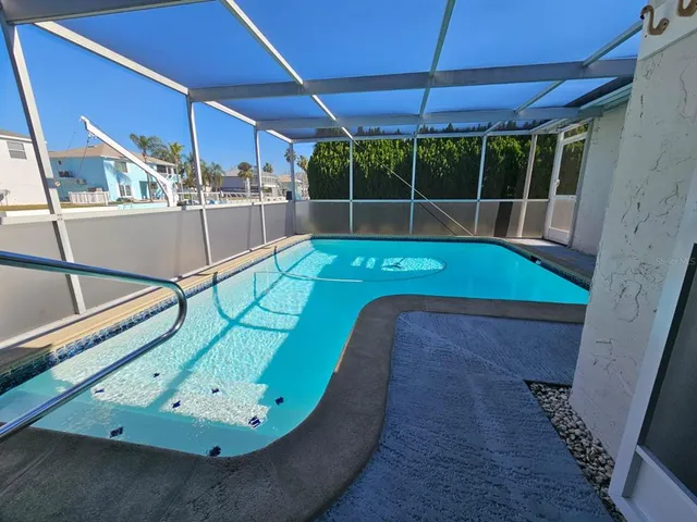 a view of a balcony with chairs