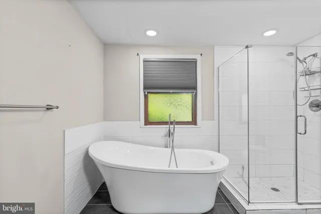 a bathroom with a sink and a shower