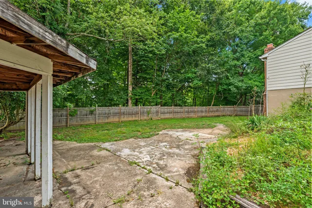 a view of backyard with green space