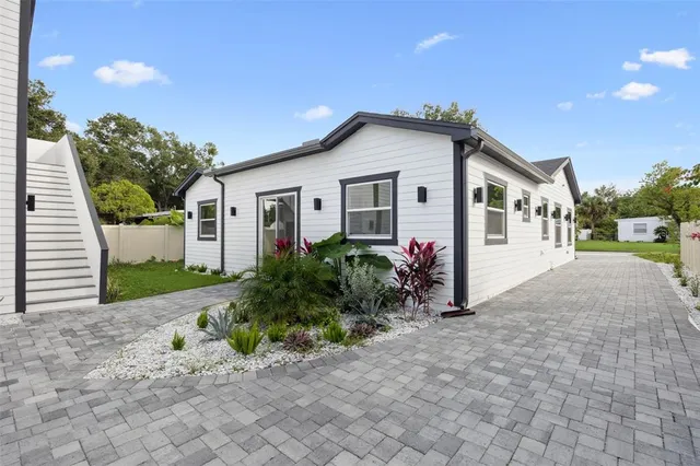 a view of a house with a yard