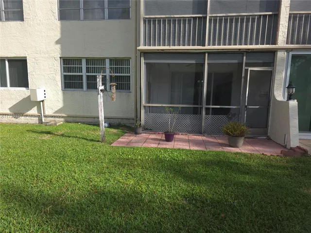 a garden view with a seating space