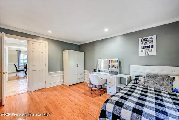 a utility room with lots of racks on the wall