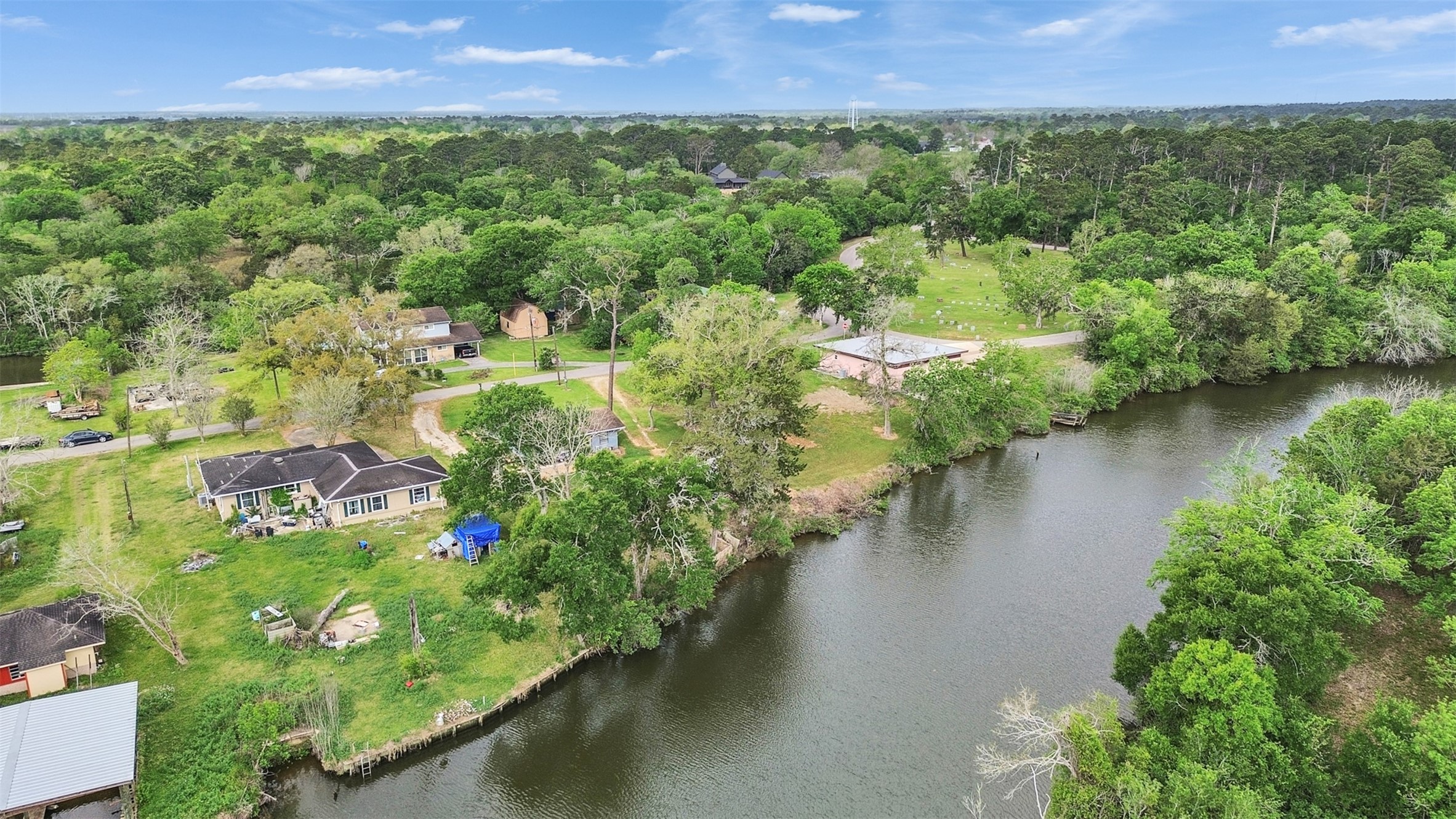 3315 St Anne Street Liverpool, TX 77577 - Photo 46 of 48 an aerial view of residential house with outdoor space and lake view