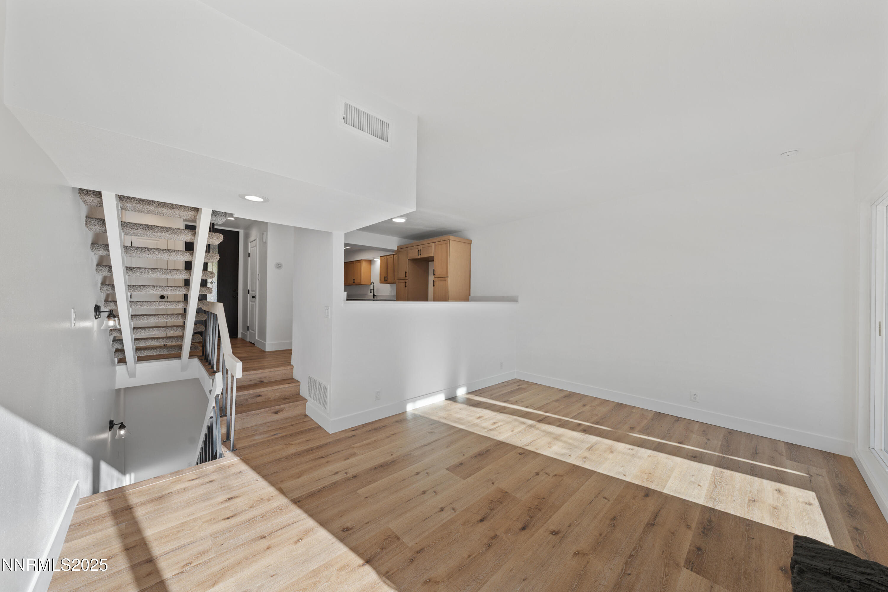 1340 Jones Street Reno, NV 89503 - Photo 22 of 58 a view of empty room with wooden floor