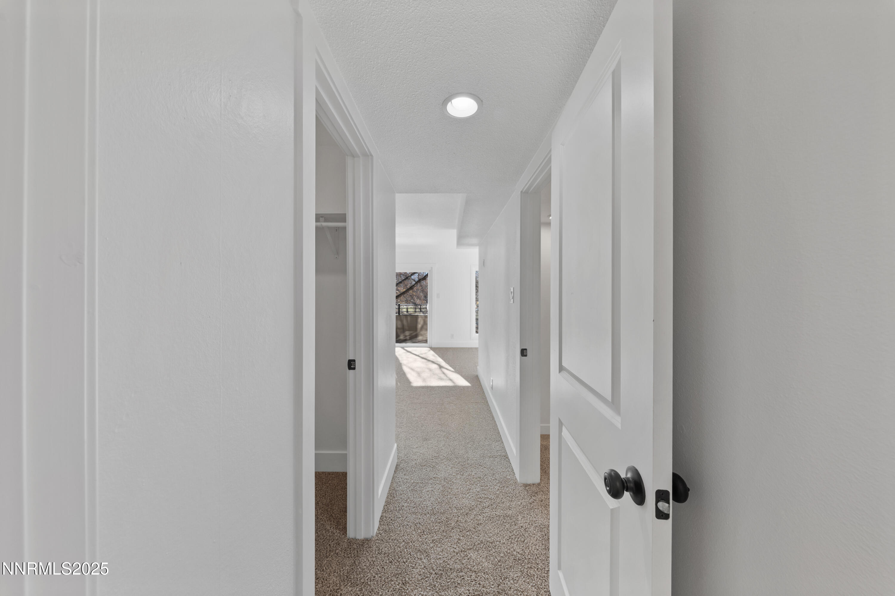 1340 Jones Street Reno, NV 89503 - Photo 34 of 58 a view of a hallway with wooden shelves