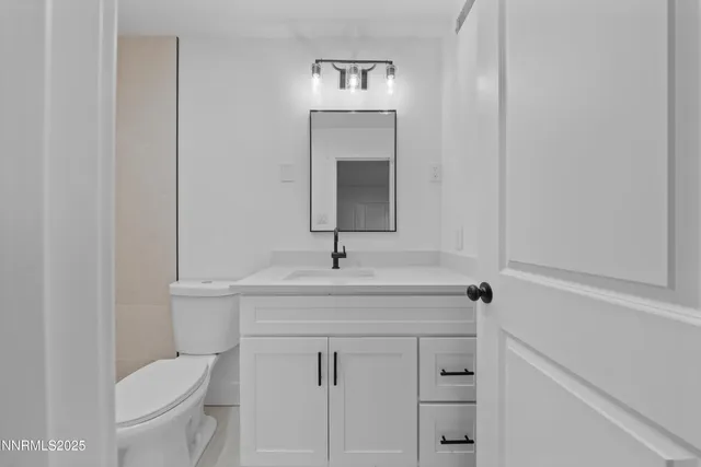 a view of a brick building with many windows