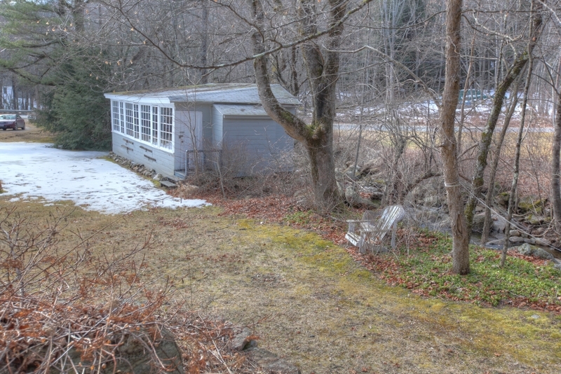 134 Sandisfield Road Sandisfield, MA 01255 - Photo 8 of 38 a studio outbuilding on the riverbank