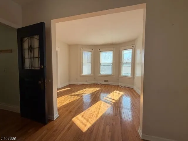 a view of a kitchen with a sink and cabinet area