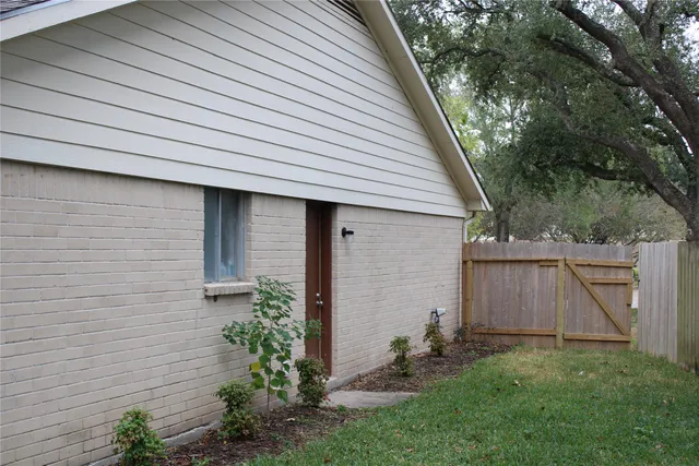 a view of a backyard with a garden