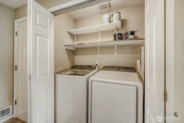a utility room with dryer and washer