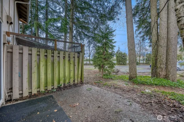 a backyard of a house with lots of green space