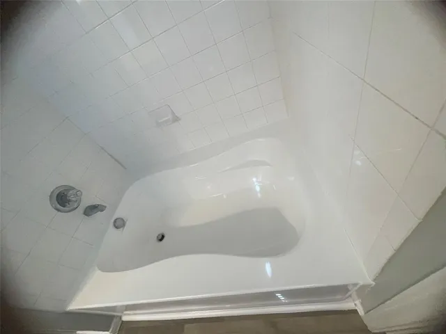 a hallway with wooden floor