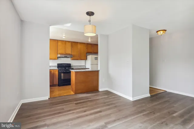 a view of kitchen with wooden floor