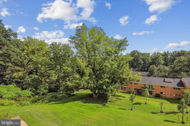 aerial view of a house with a yard