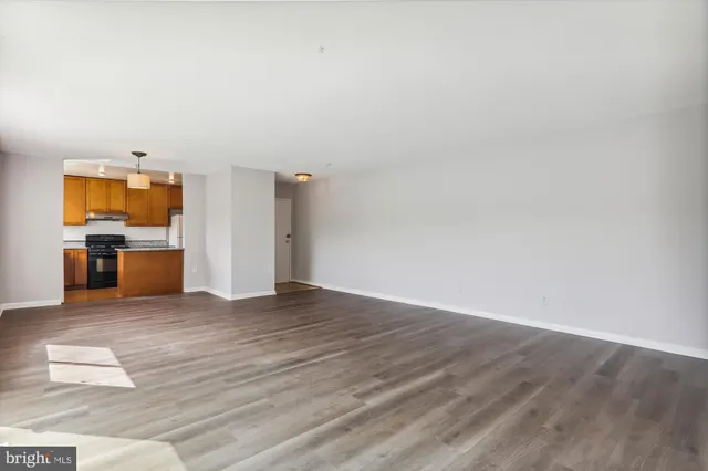 a view of a kitchen with a sink and a microwave